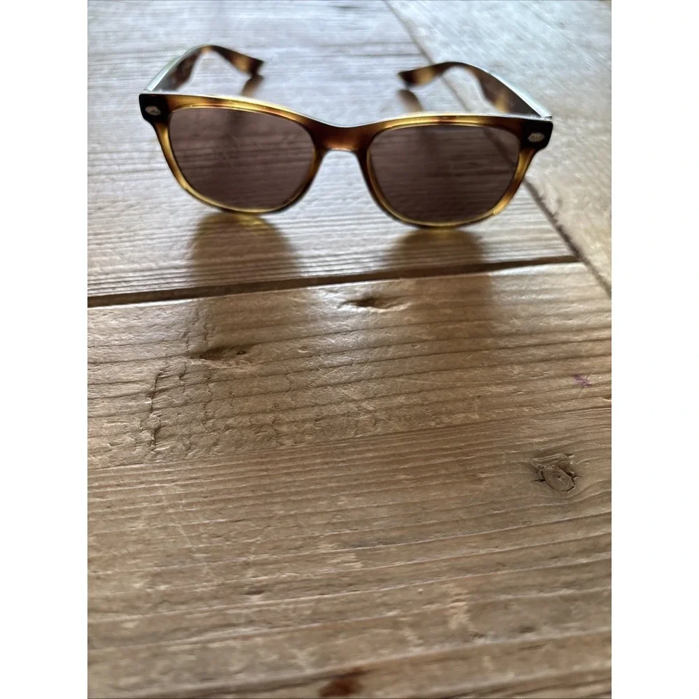 Pre-owned Ray-Ban Junior sunglasses. Scratched lenses; good frame. See photos.